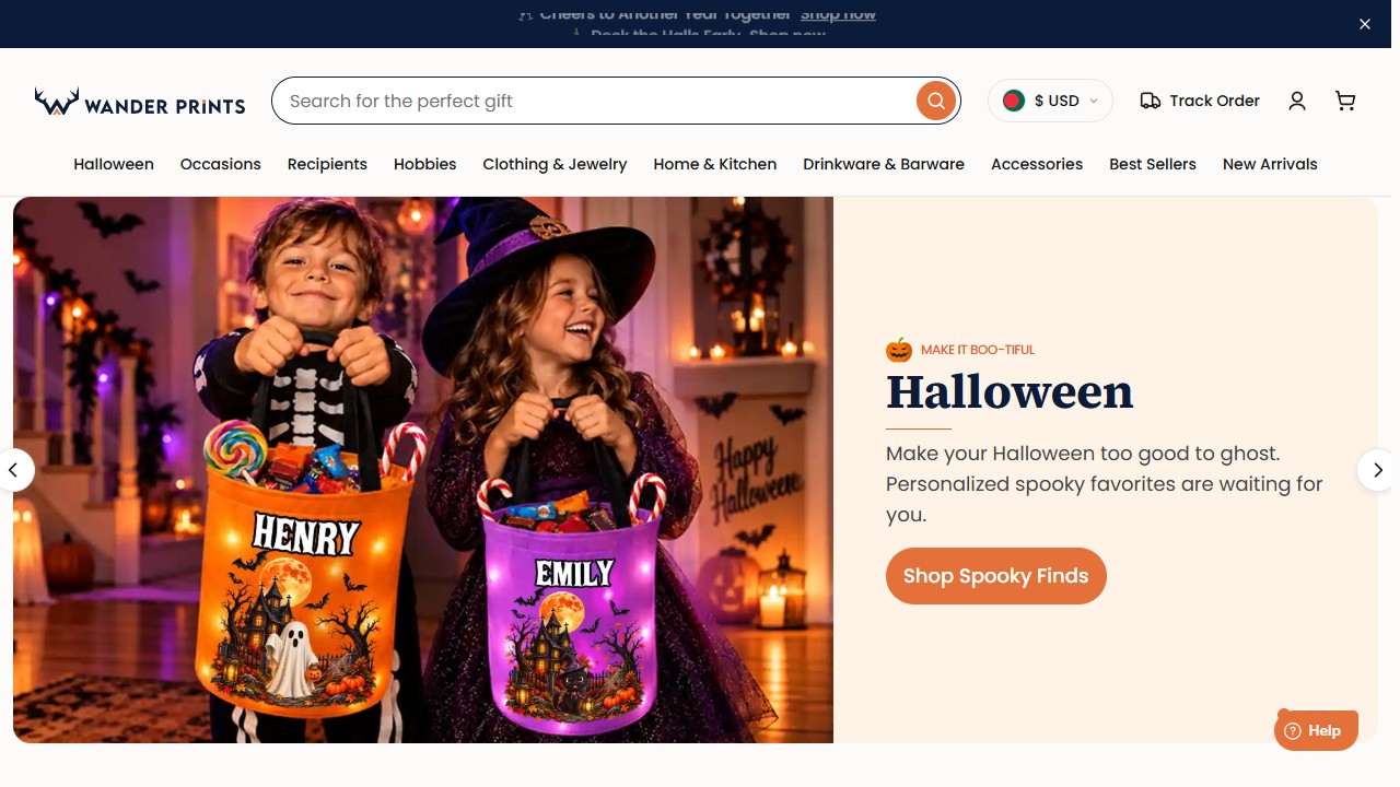 Wander Prints storefront homepage with a seasonal gifting hero and category navigation